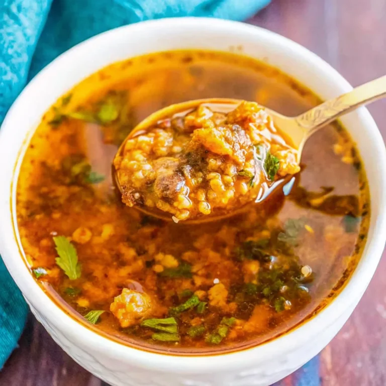 Rich and flavorful cowboy butter served in a bowl with fresh herbs, perfect for grilling, dipping, or topping steaks.