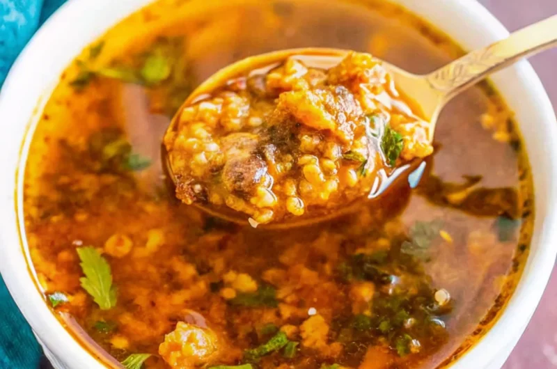Rich and flavorful cowboy butter served in a bowl with fresh herbs, perfect for grilling, dipping, or topping steaks.