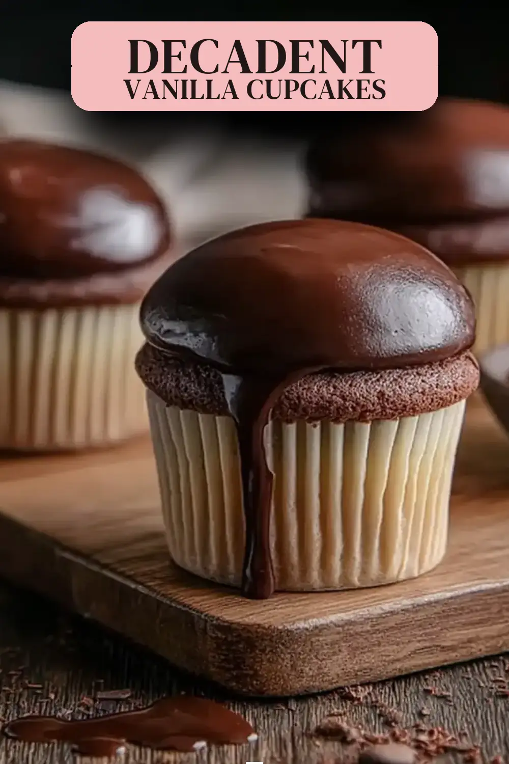Vanilla Cupcakes with Custard Filling and Chocolate Ganache