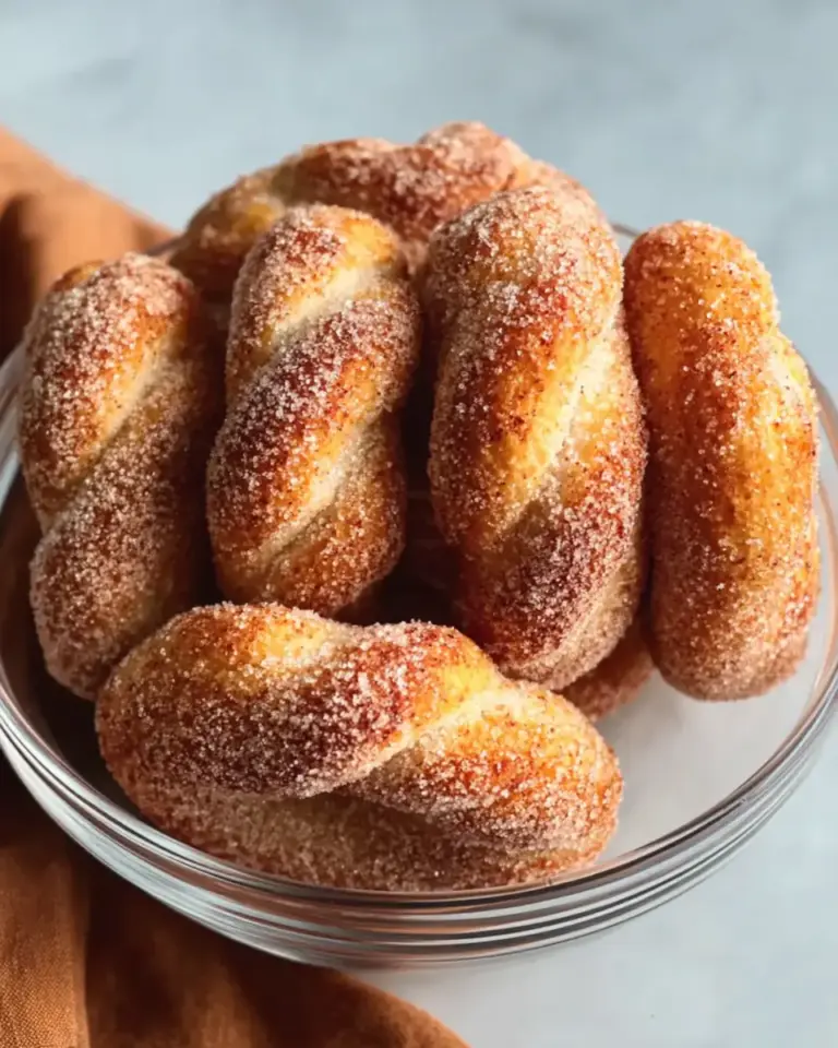 A delicious plate of Homemade Cinnamon Sugar Twist Donuts Recipe
