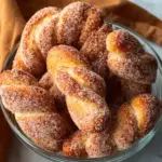 A delicious plate of Homemade Cinnamon Sugar Twist Donuts Recipe