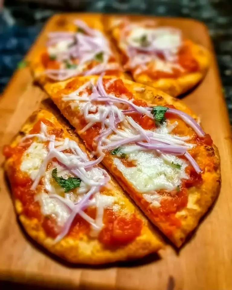 A delicious plate of Crispy Air Fryer Naan Pizza Recipe