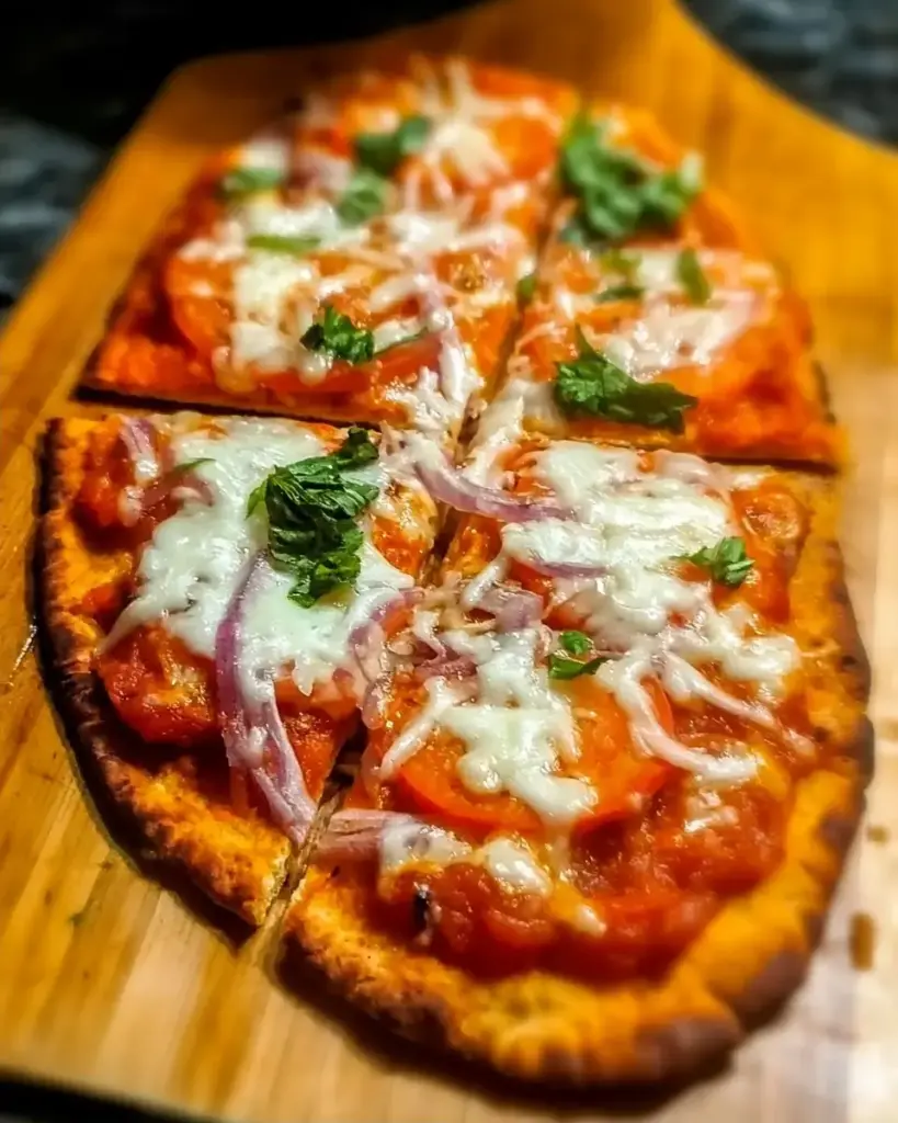 A delicious plate of Crispy Air Fryer Naan Pizza Recipe