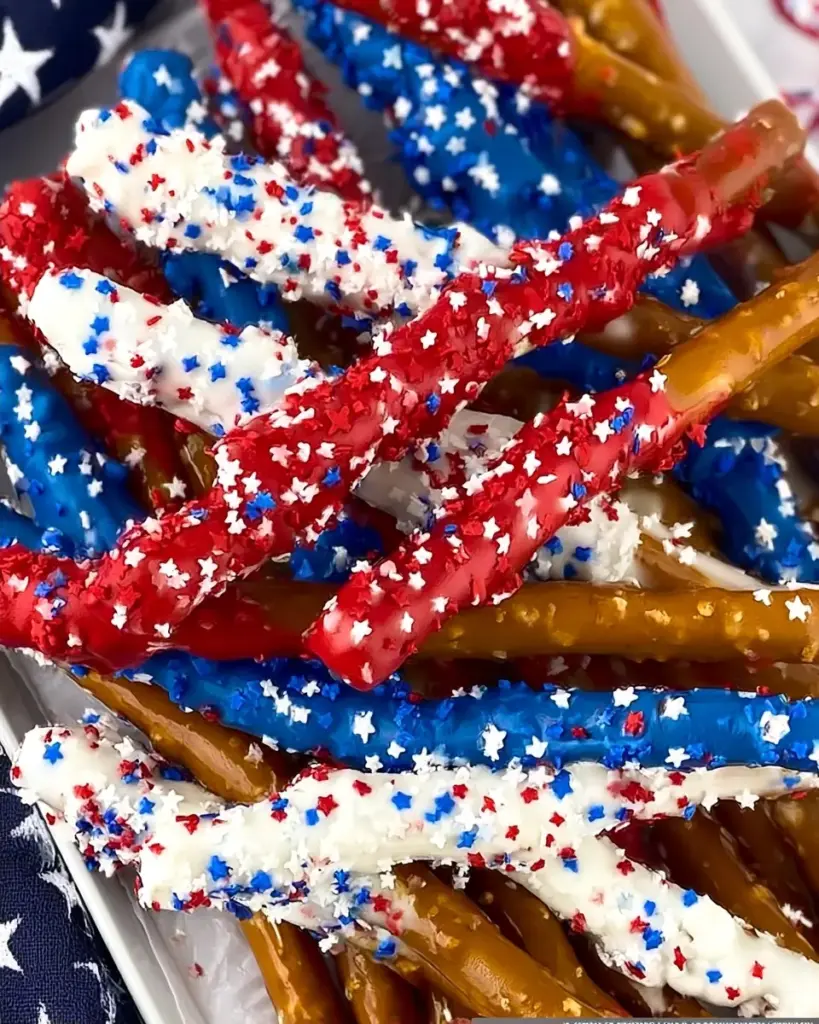 A delicious plate of 4th of July Chocolate Covered Pretzel Rods