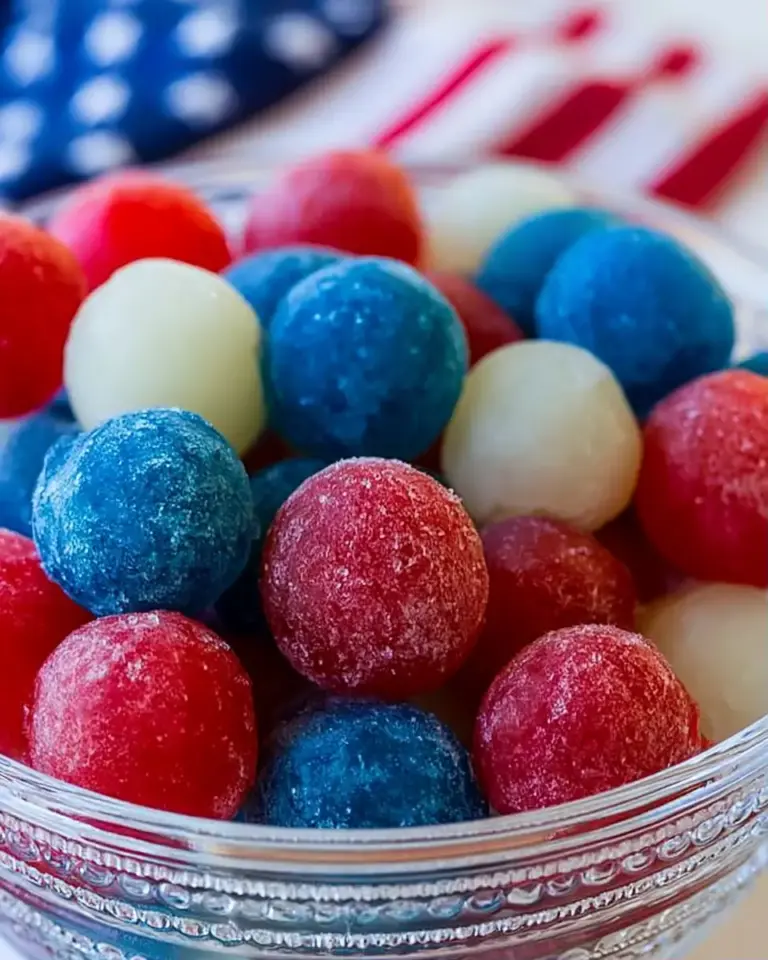 A delicious plate of 4th of July Frozen Jello Grapes: The Best Refreshing Treat
