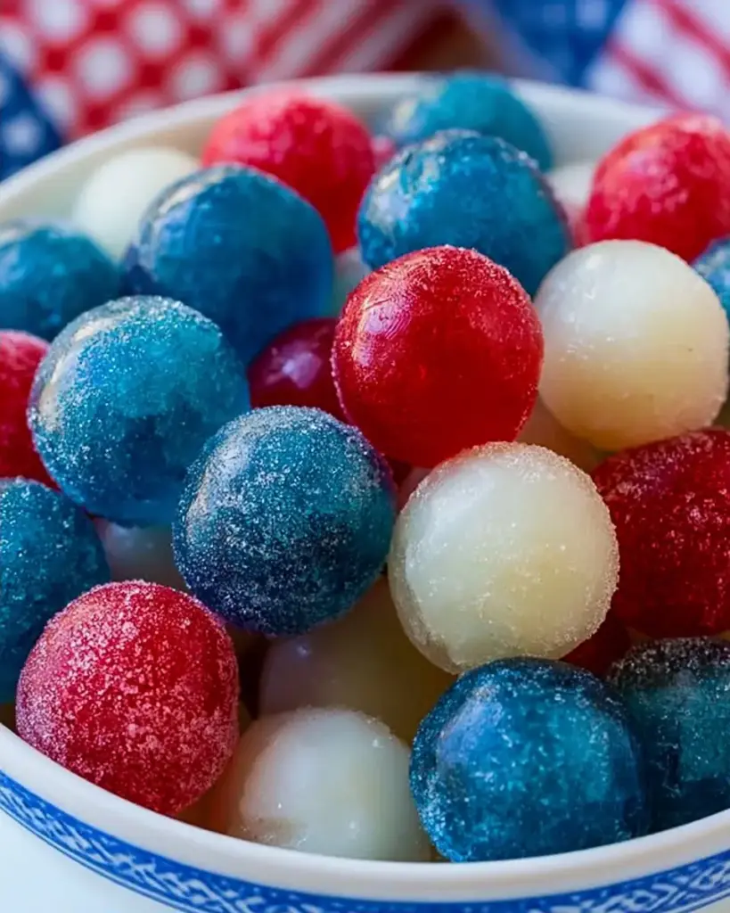 A delicious plate of 4th of July Frozen Jello Grapes: The Best Refreshing Treat