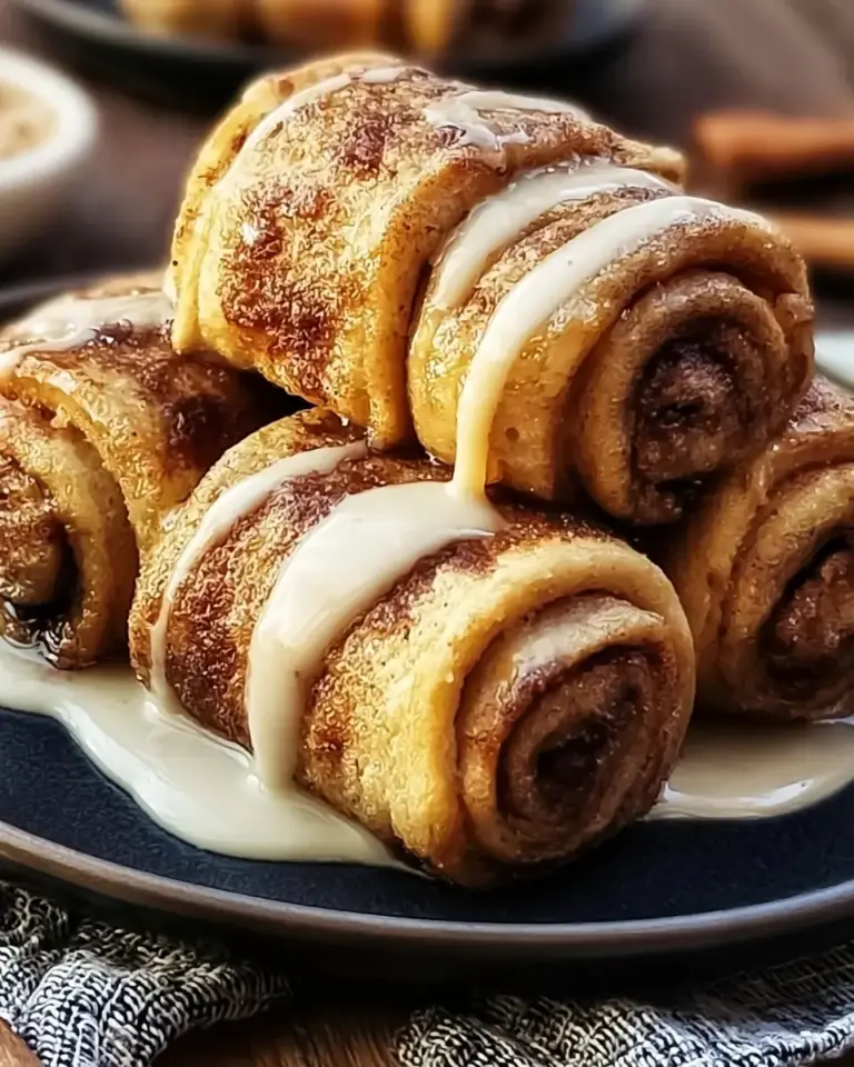 A delicious plate of Cinnamon Roll French Toast Roll-Ups