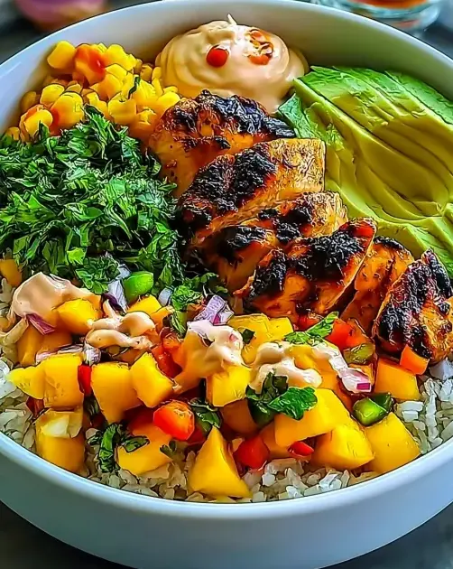 A delicious plate of Irresistible 30-Min Chicken Mango Rice Bowl You'll Adore