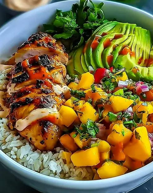 A delicious plate of Irresistible 30-Min Chicken Mango Rice Bowl You'll Adore