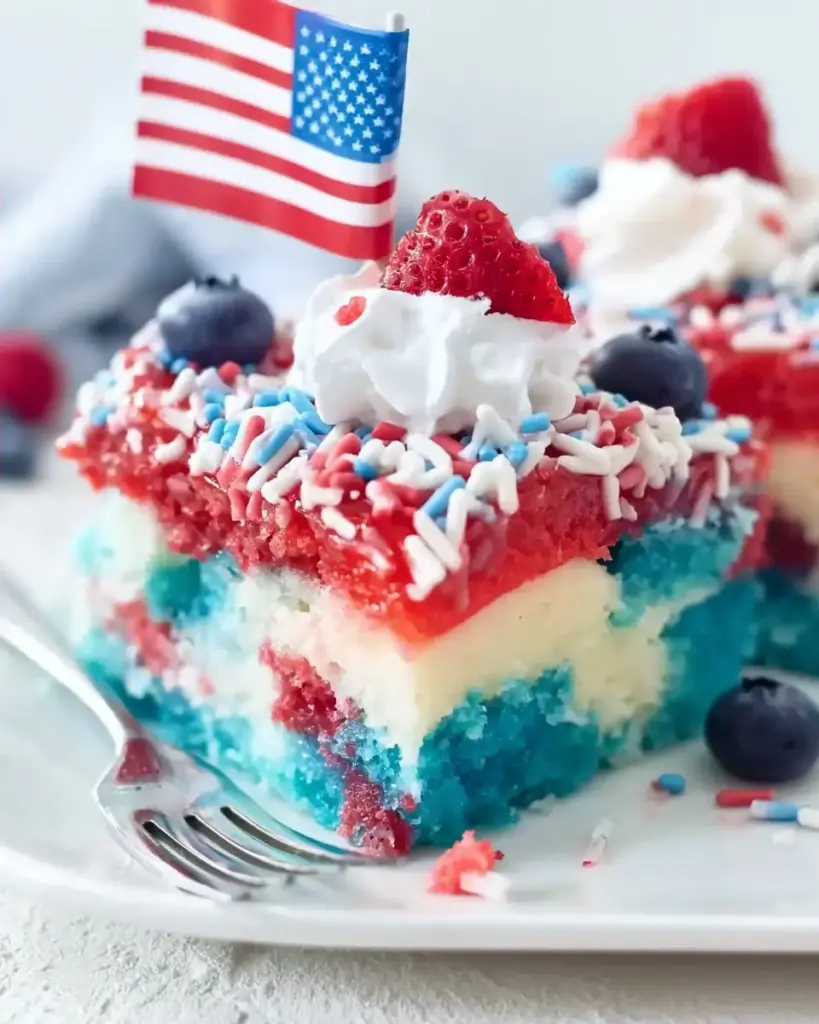 A delicious plate of Patriotic Poke Cake