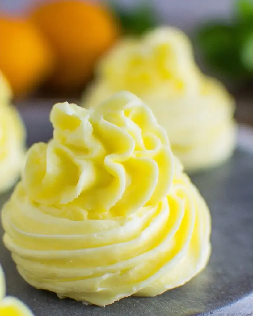 A delicious plate of The Best Lemon Buttercream Recipe (video)