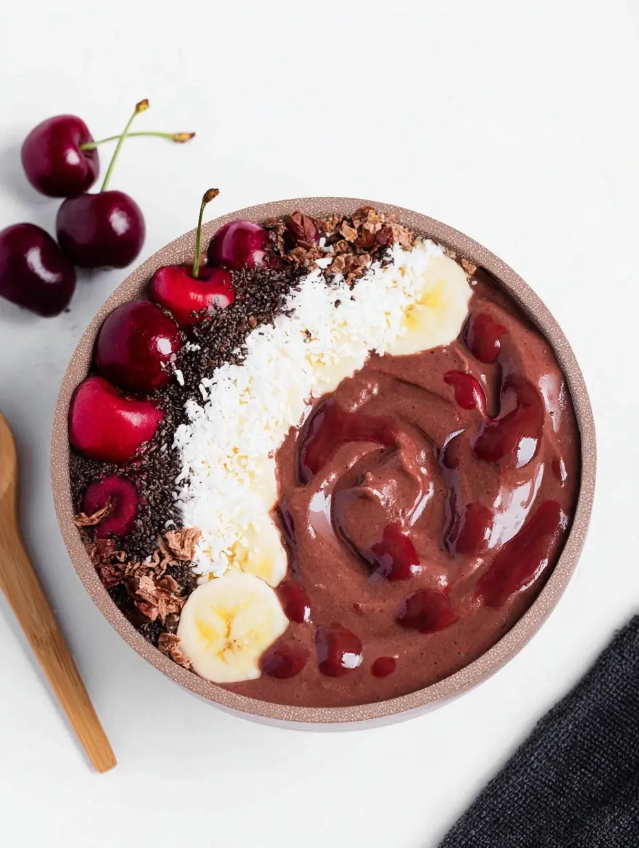 A delicious plate of Chocolate Cherry Smoothie Bowl