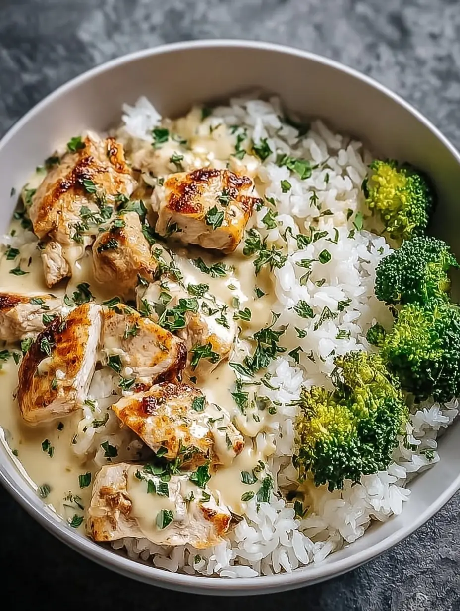 A delicious plate of Creamy Garlic Chicken Rice Bowls Easy and Quick