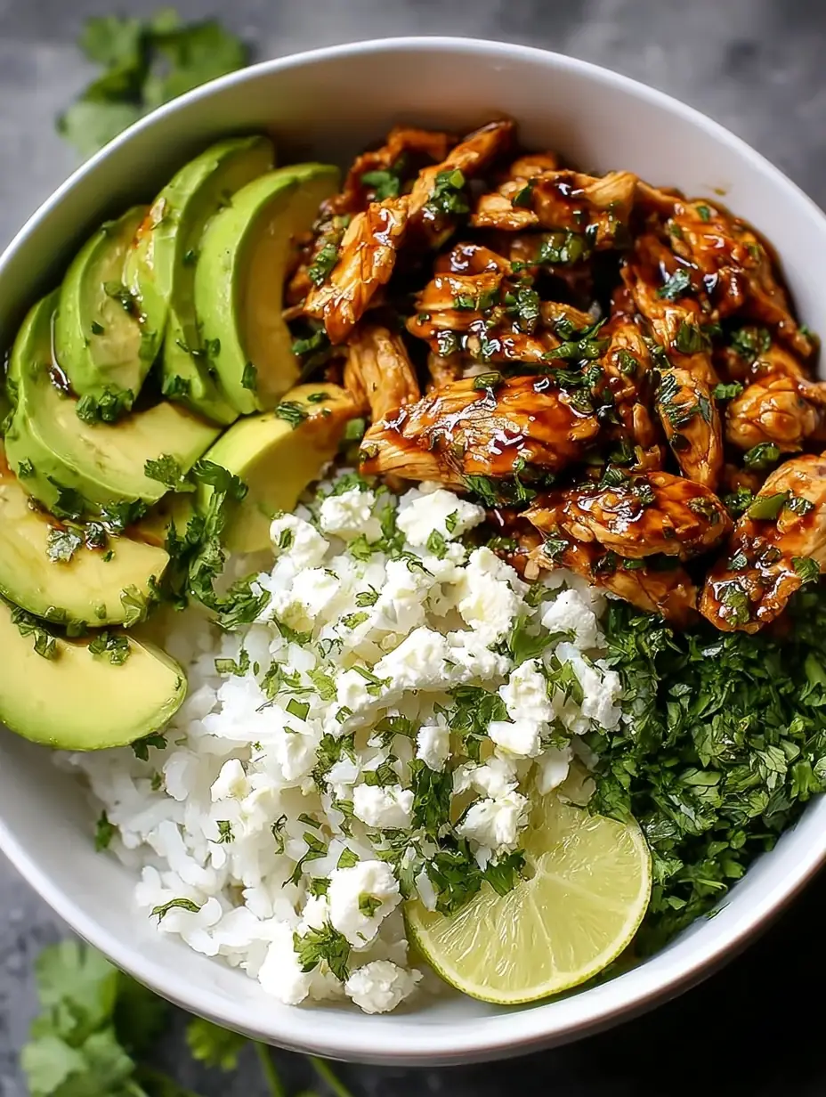 A delicious plate of Honey Lime Chicken & Avocado Rice Bowl – High Protein Healthy Dinner Idea