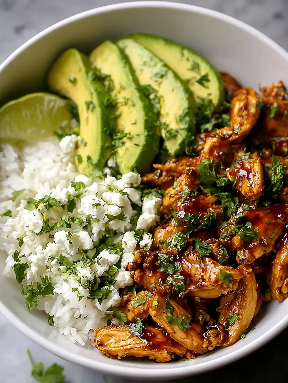 A delicious plate of Honey Lime Chicken & Avocado Rice Bowl – High Protein Healthy Dinner Idea