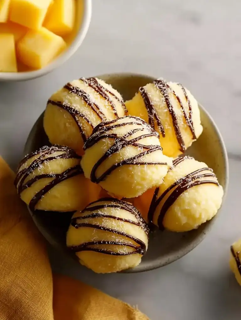 A delicious plate of Mango Frozen Yogurt Bites